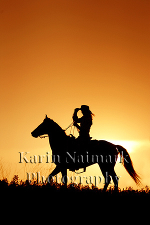 Woman on Horse at Sunset